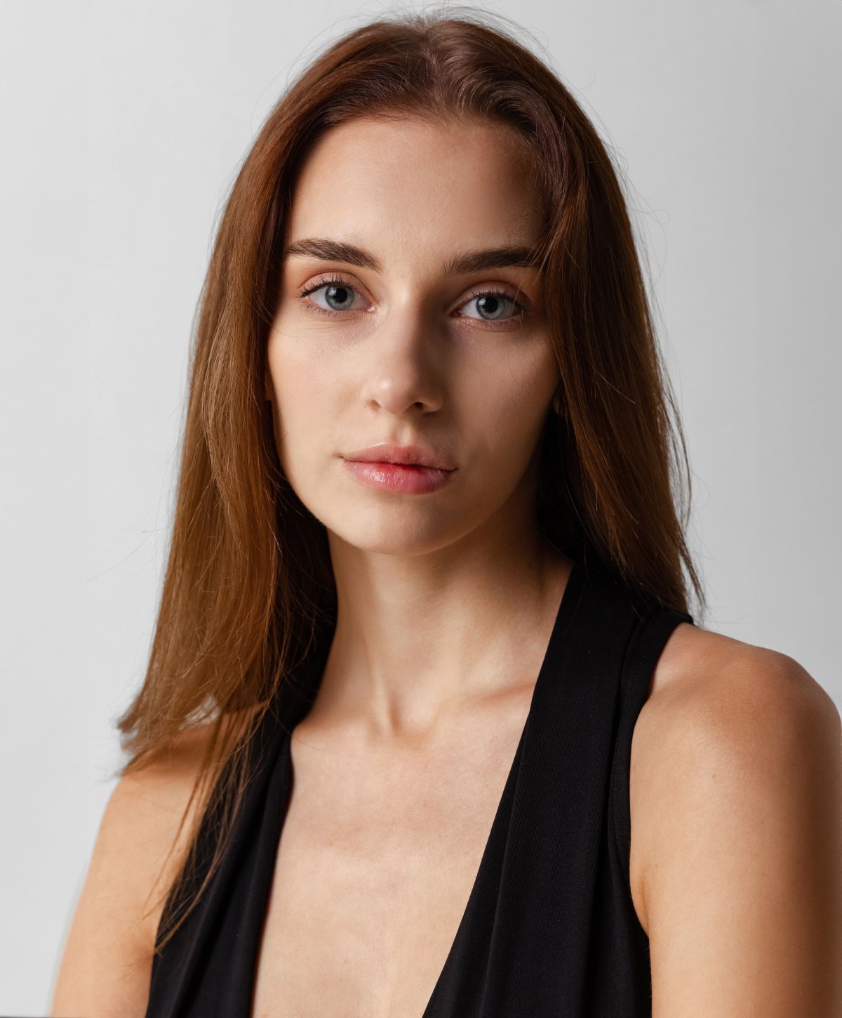 Portrait of woman with natural makeup and expression.