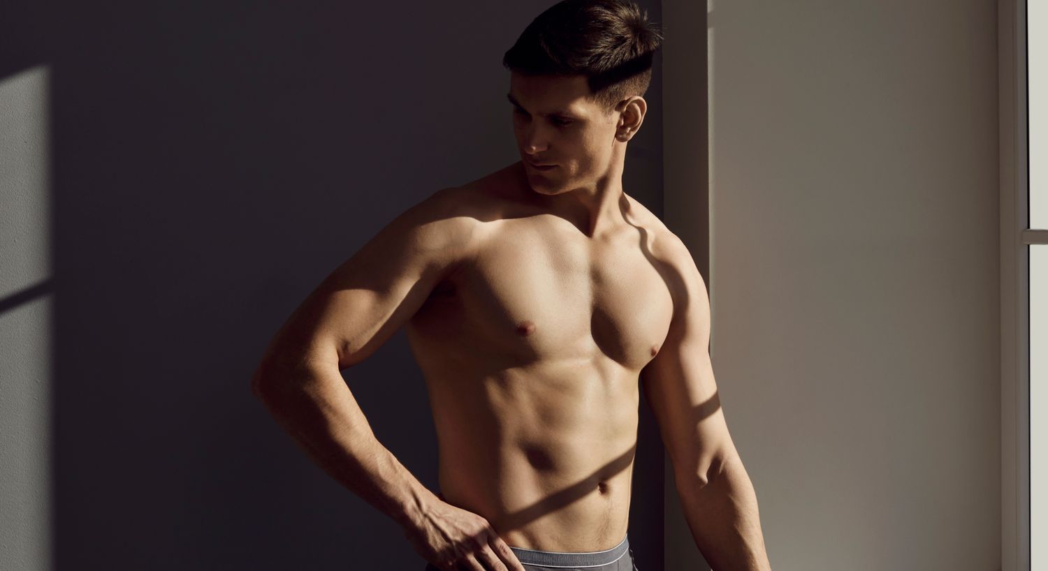 Male model posing in natural light.